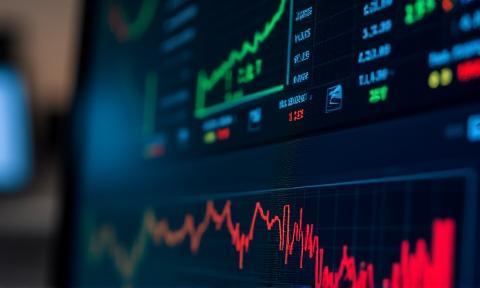 Screenshot of a financial news website homepage with stock charts